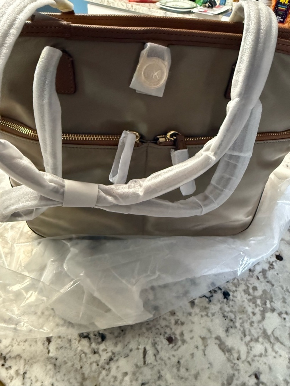 Michael Kors Beige Tote with Tan Trim and Gold Hardware